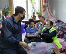 锦州市省自强模范陶中志走进特困残疾人家庭
