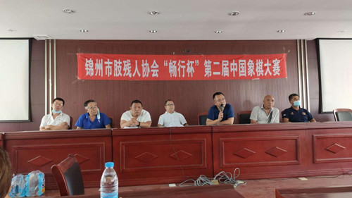 图为市残联组宣科刘卫民科长讲话