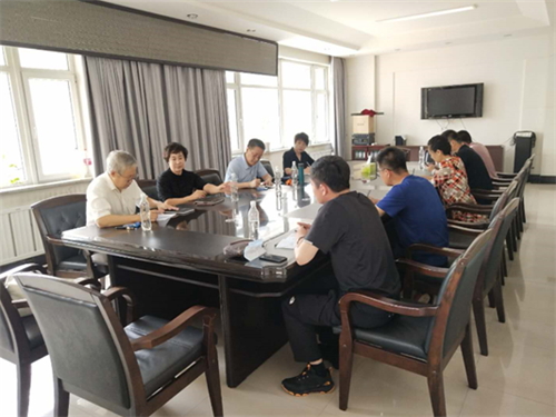 图为省残联检查调研组在市残联召开权益保障工作座谈会议现场