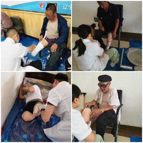 图为正在为残疾进行假肢取型