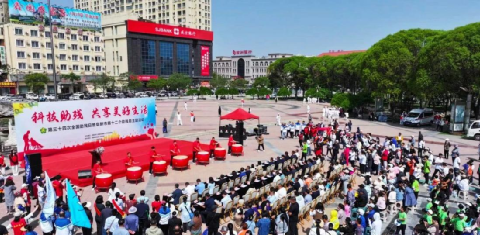 图为“科技助残 新盛伴出行”项目阜新捐赠现场