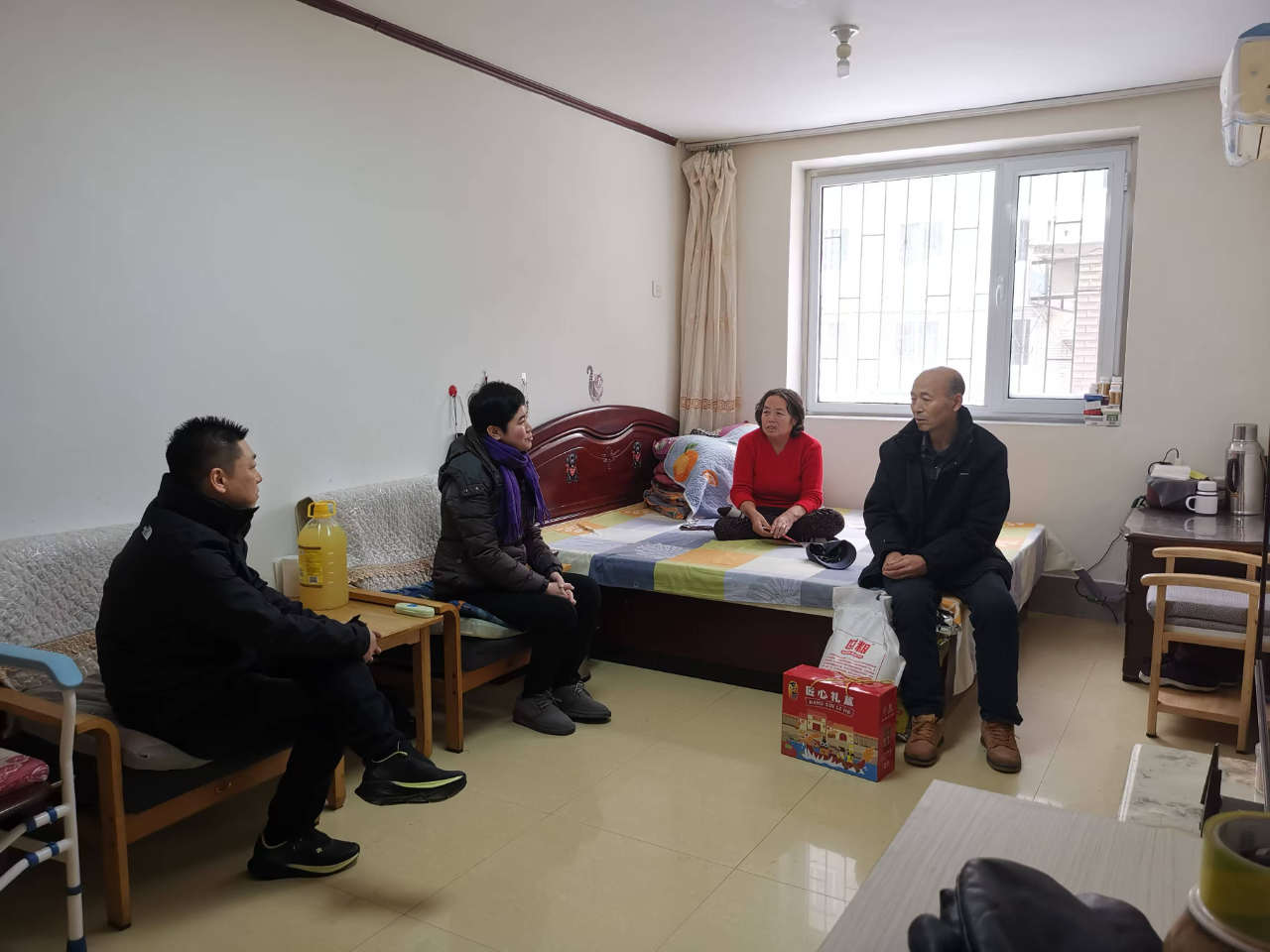 图为走访慰问困难残疾人